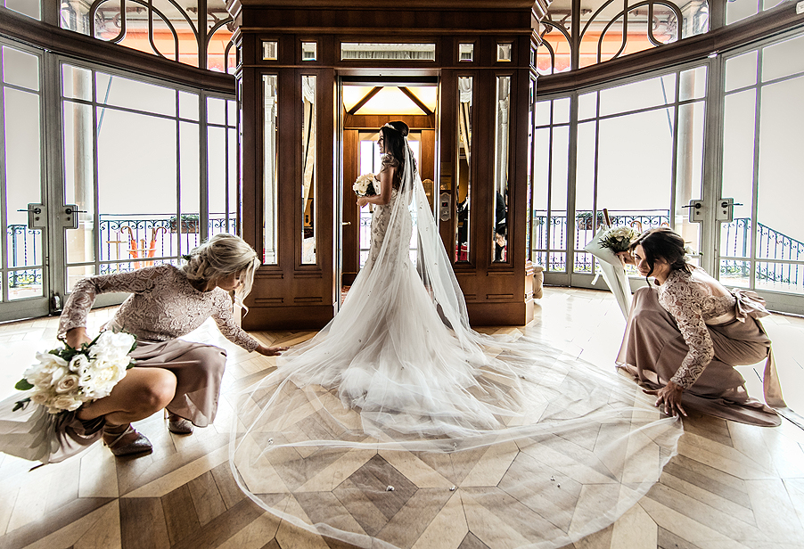 Bridesmaids-helping-the-bride-on-the-Lske-Como-wedding-day-at-Grand-Hotel-Tremezzo-by-wedding-planner-My-Lake-Como-Wedding